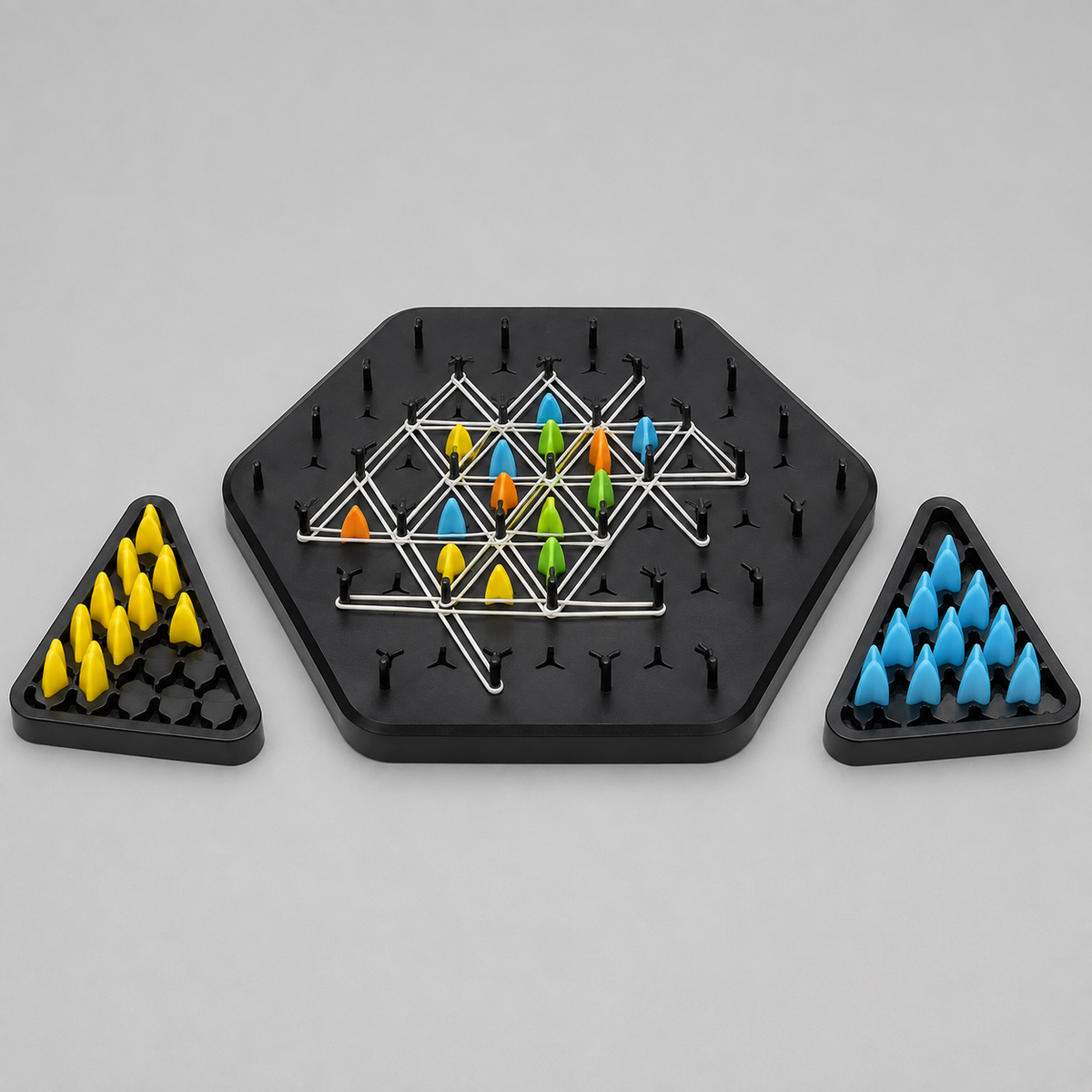 Strategy pegboard game with storage trays